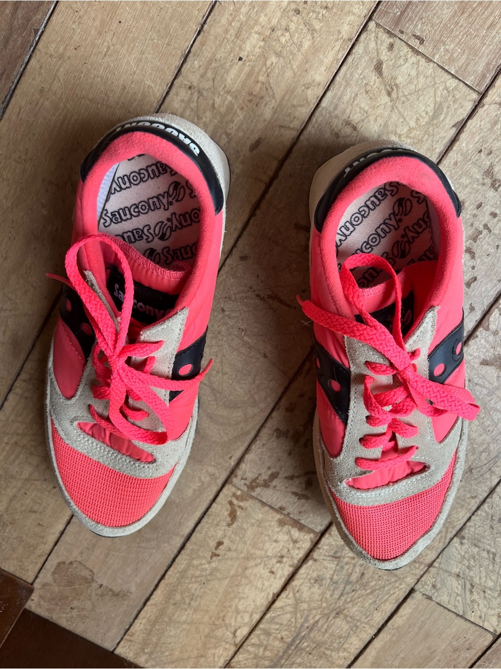 Saucony women’s Bright Pink and Black Sneakers